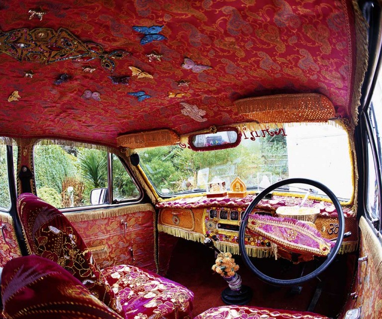 Brightly coloured Indian taxi interior