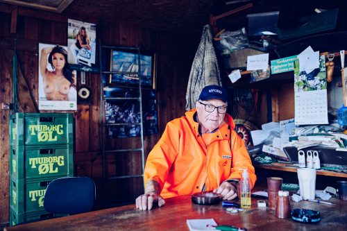 Portrait of a fisherman in his cabin