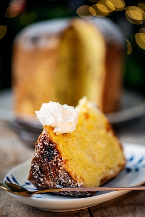 Slice of Panettone served with a dollop of mascarpone cheese.